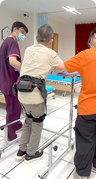 Older adult using a walking assist exoskeleton with support