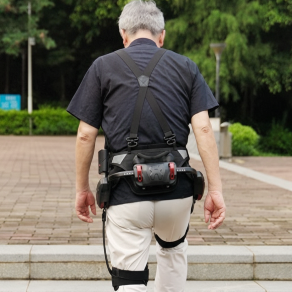 Older adult wearing a walking assist exoskeleton outdoors